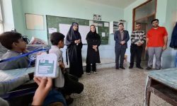 تجلیل از مقام معلم در دبستان پسرانه عاشورا کرمانشاه