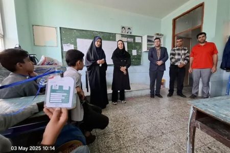 تجلیل از مقام معلم در دبستان پسرانه عاشورا کرمانشاه